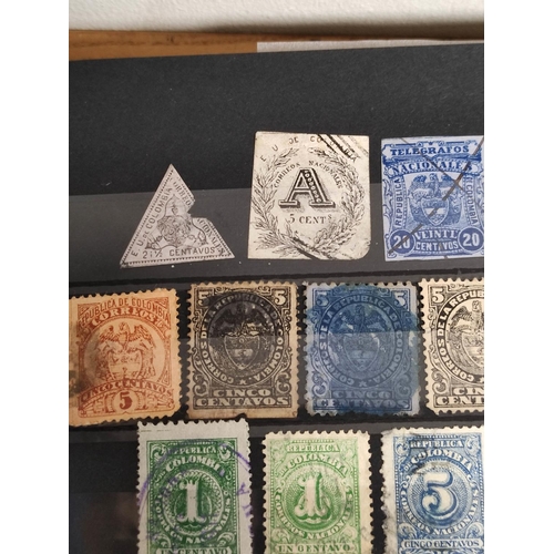 264 - World. Three postage stamp albums arranged alphabetically by country ranging from Abu Dhabi to Franc... 