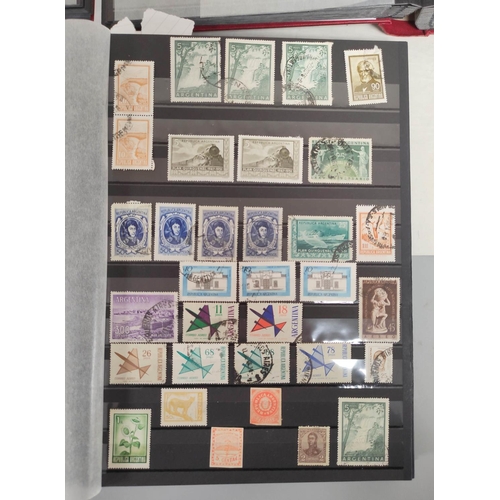 264 - World. Three postage stamp albums arranged alphabetically by country ranging from Abu Dhabi to Franc... 