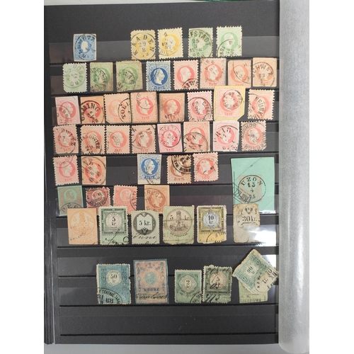 264 - World. Three postage stamp albums arranged alphabetically by country ranging from Abu Dhabi to Franc... 