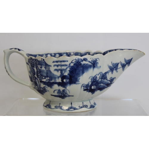416 - Mid 18th century Bow porcelain blue and white ribbed sauceboat in 