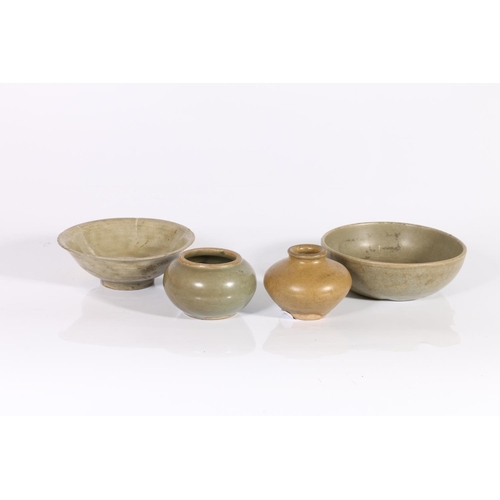 415 - Four pieces of celadon ware, Yuan, Ming and later, a small flaring dish with petal rim, 11.5cm, a de... 