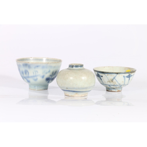 417 - Two provincial Ming blue and white dishes, one decorated with geometric designs, 8cm, the other with... 