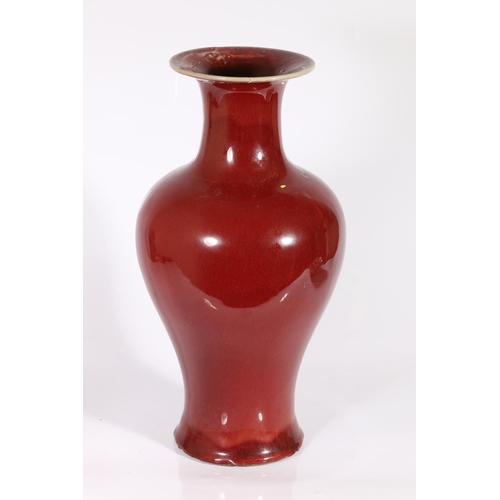 426 - Chinese sang-de-boeuf vase of baluster shape, with flaring rim, and foot, 37cm.