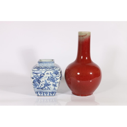 432 - 19th century Chinese flambe glazed bottle vase, 23.5cm, and a blue and white jar of rounded square s... 