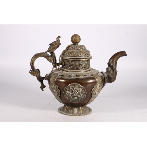 441 - Large, late 19th century Tibetan wine or water jug, with domed lid and dragon handle, the bronze bod... 