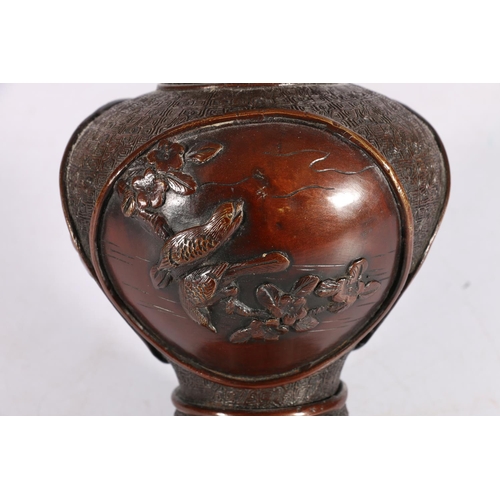 442 - Japanese bronze vase, the long neck with elongated faux handles, decorated with panels of birds and ... 