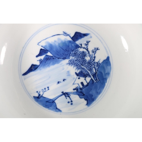 456 - Late 19th century blue and white bowl decorated with landscape scenes to the exterior and interior.