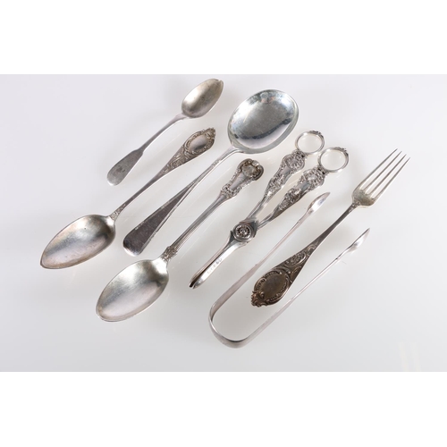 50Q - Group of silver flatware to include a pair of Georgian silver sugar tongs by Thomas Watson or Thomas... 