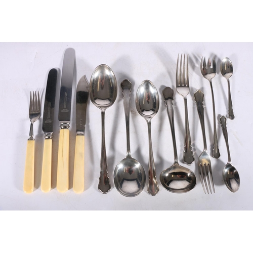 50U - Suite of George V silver flatware including six table spoons, twelve table forks, twelve soup spoons... 