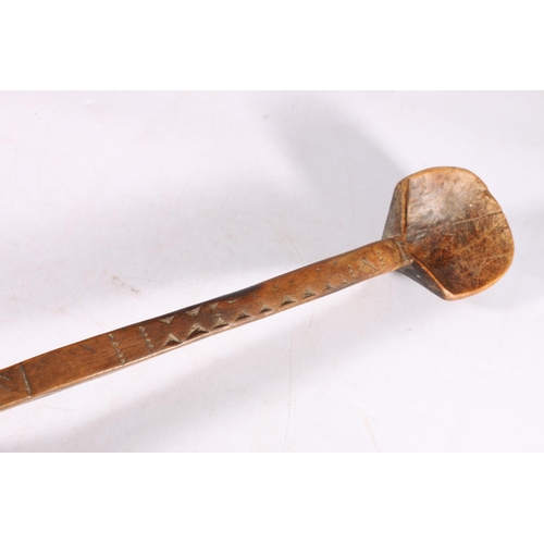 400 - Large African spoon, with shovel bowl and serrated decoration the shaped handle with incised chevron... 