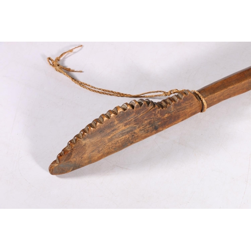 400 - Large African spoon, with shovel bowl and serrated decoration the shaped handle with incised chevron... 