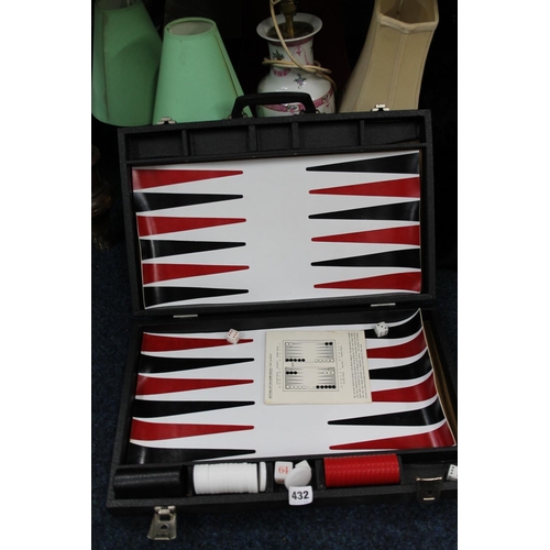 432 - Travel backgammon set.