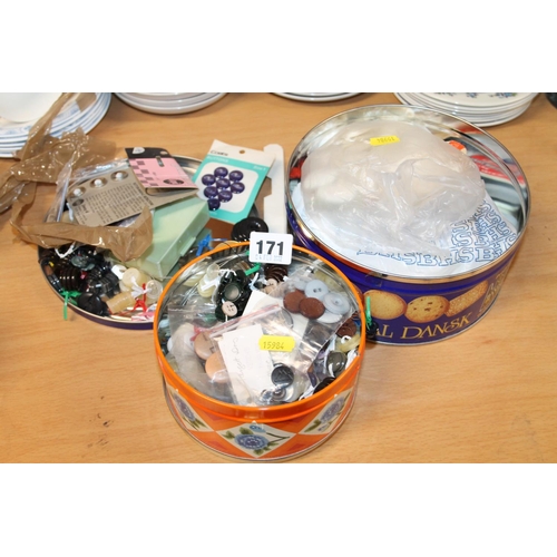 171 - Three tins containing haberdashery.
