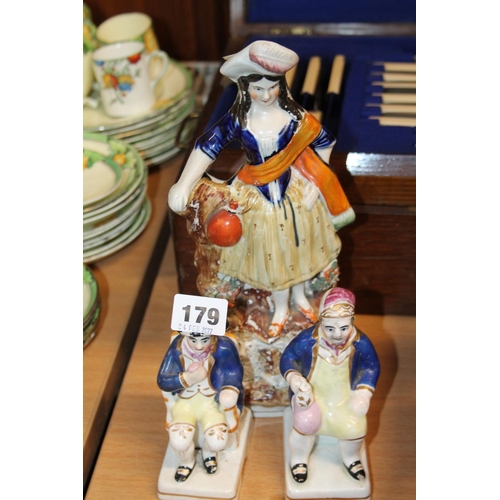 179 - Staffordshire figure and two others.
