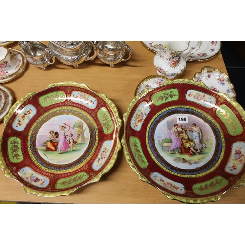 190 - Pair of Vienna style chargers, depicting figures, signed Kaufmann.