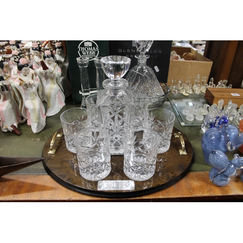 205 - Glass set comprising decanter and six tumblers on brass twin-handled tray.