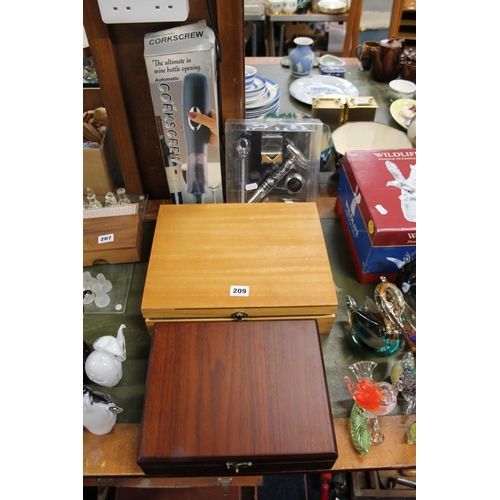 209 - Corkscrew bottle opening sets, and others.