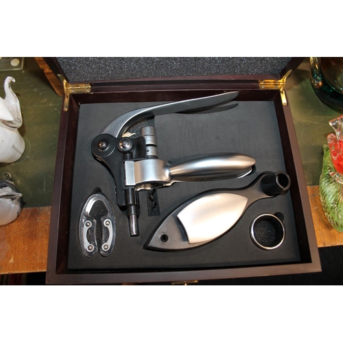 209 - Corkscrew bottle opening sets, and others.