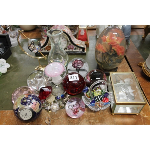 211 - Glass paperweights, a jewellery casket, glass sweets, etc.