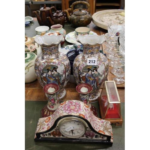 212 - Pair of oriental vases, floral decorated candlesticks, etc.