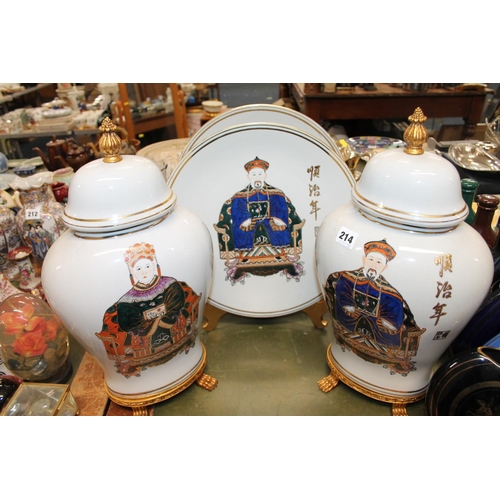 214 - Pair of figure decorated, crackle glazed, oriental urns and covers and matching chargers on stands.