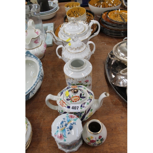 407 - Victorian ceramics to include a teapot, a sucrier, a ginger jar, a vase, and others.