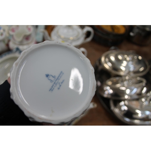 407 - Victorian ceramics to include a teapot, a sucrier, a ginger jar, a vase, and others.