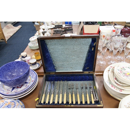 427 - Oak cased part set of fish knives and forks.
