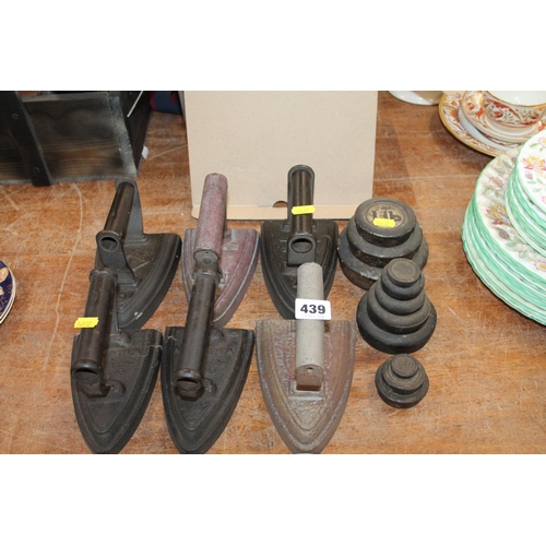 439 - Flat iron and vintage weights.