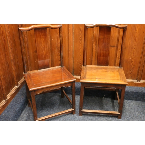 443 - Pair of 20th century Chinese hardwood chairs, with plain splat backs, the rectangular solid seats wi... 