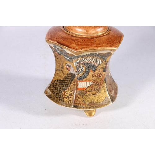 457 - Satsuma jar and cover of hexagonal form on triple supports the body decorated with multiple figures.... 