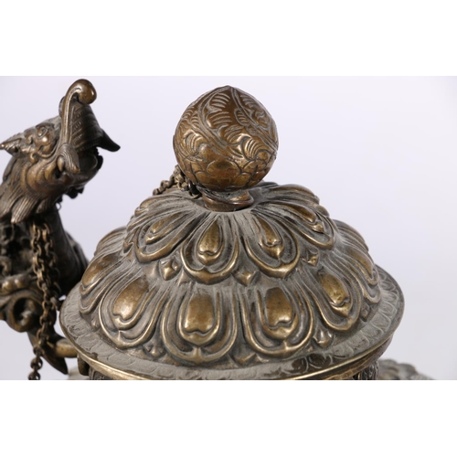 441 - Large, late 19th century Tibetan wine or water jug, with domed lid and dragon handle, the bronze bod... 