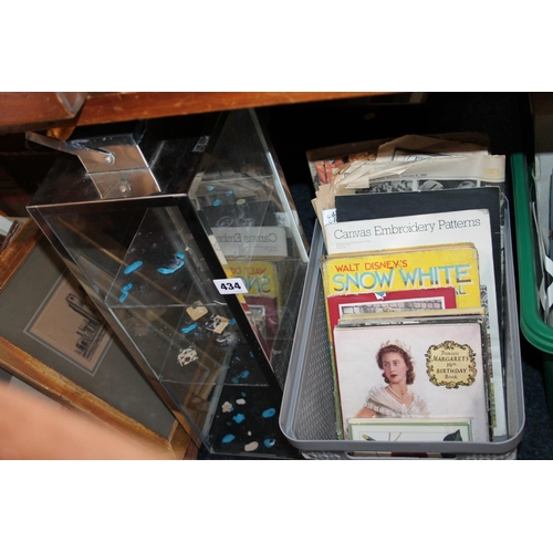 434 - Box containing embroidery patterns, Snow White Annual, other books, and a glass display case.