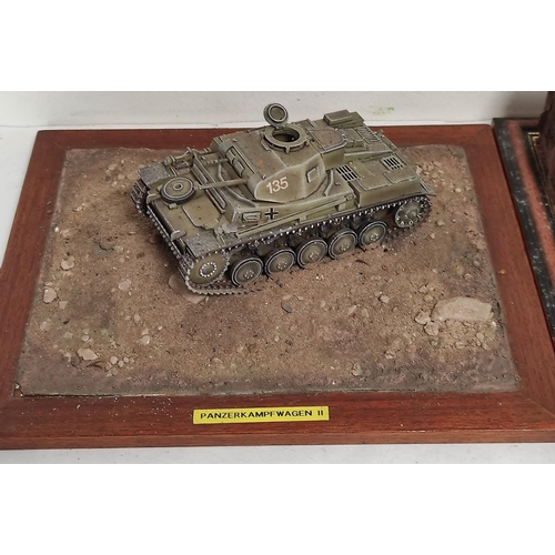 69 - Three collector's model military vehicles. To include a Panzerkampfwagen II, a Sd. KFz 9 