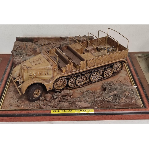 69 - Three collector's model military vehicles. To include a Panzerkampfwagen II, a Sd. KFz 9 