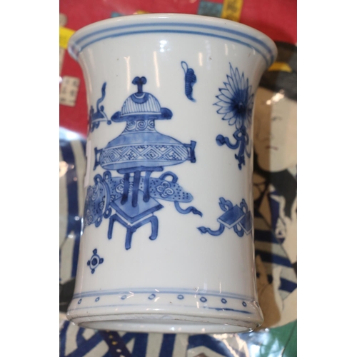 450 - Early 20th century Chinese blue and white brush pot decorated with Buddhist items including the ruyi... 