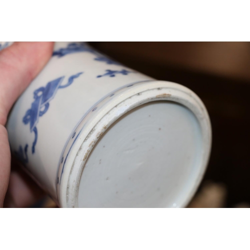 450 - Early 20th century Chinese blue and white brush pot decorated with Buddhist items including the ruyi... 