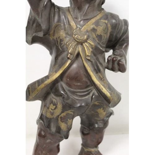 262 - Japanese Meiji Period lacquered bronze figure of an Oni standing with raised arm and clenched fist, ... 