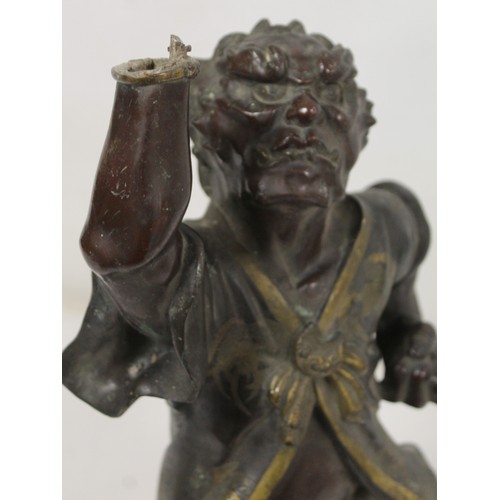 262 - Japanese Meiji Period lacquered bronze figure of an Oni standing with raised arm and clenched fist, ... 