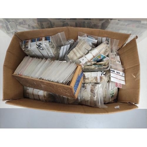 276 - Two boxes containing a huge collection of world postage stamps from the estate of a local collector.... 