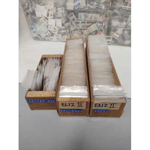 276 - Two boxes containing a huge collection of world postage stamps from the estate of a local collector.... 