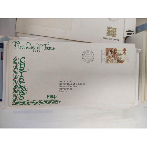 278 - Box containing a large collection of postage stamp first day covers dating from the 1940s-1980s. To ... 