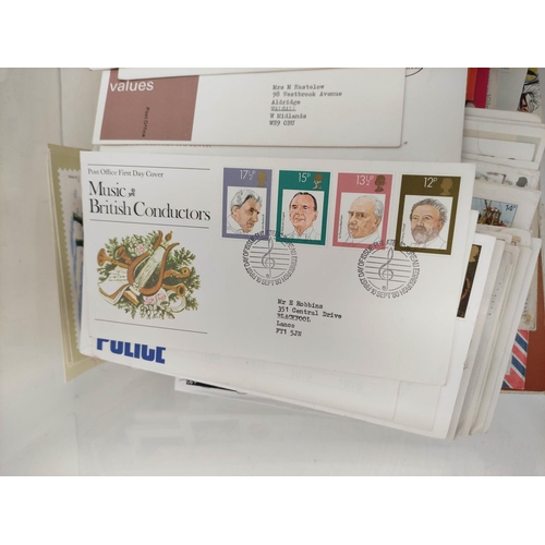 278 - Box containing a large collection of postage stamp first day covers dating from the 1940s-1980s. To ... 