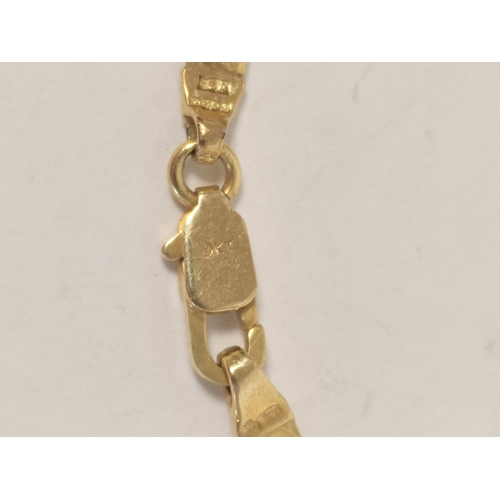 33 - 9ct gold necklet of filed curb pattern, a bracelet and a piece of belcher chain, 23g. (3).