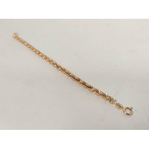 33 - 9ct gold necklet of filed curb pattern, a bracelet and a piece of belcher chain, 23g. (3).