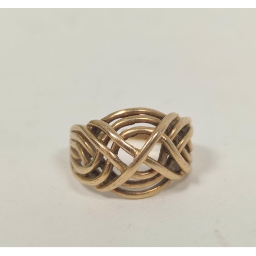 38 - 9ct gold wire ring of six strands on open band, size 'N' (variable), 4.8g.