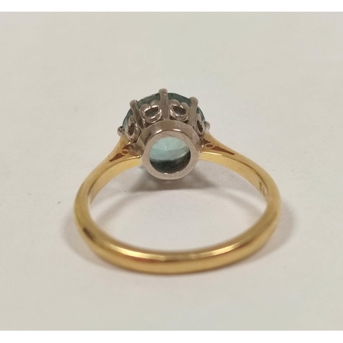 40 - Blue zircon ring, 9mm in 18ct gold, 1972, size 'N'. Very minor scuffs on facet edges otherwise good.