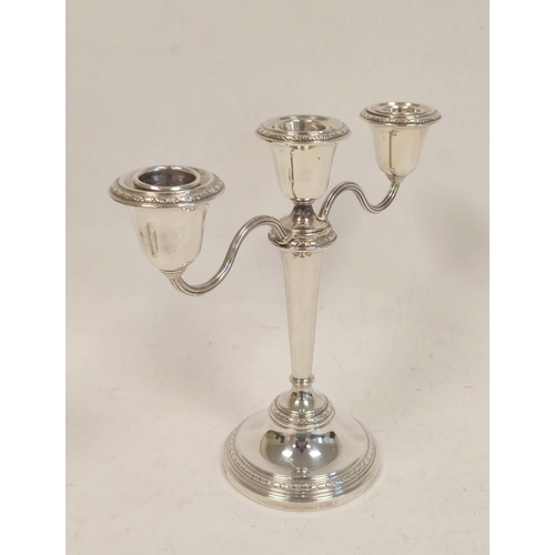 48 - Two branch three light candelabra of neo classical form, with finial, on tapering stem on circular b... 