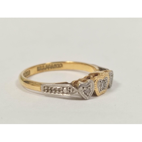 55 - Diamond three stone ring with coronet centre, 18ct and plat., size 'K', 2.5g.