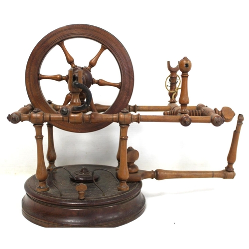 264 - Early 19th century treen bobbin winder with spoked wheel on circular plinth base, 25cm high; also a ... 